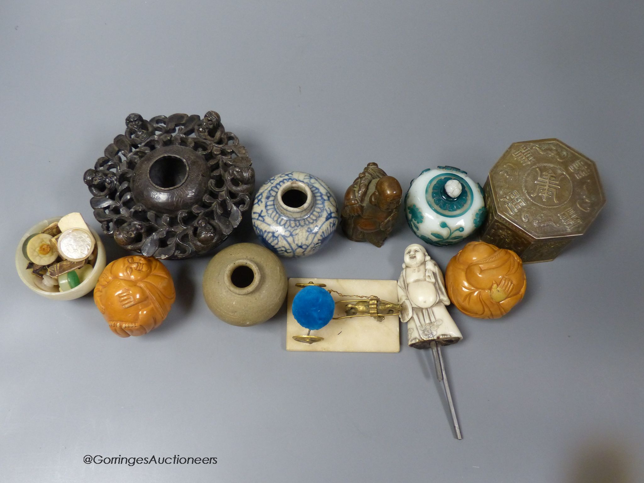A collection of Chinese decorative pieces including glass, ceramic, metal and mineral
